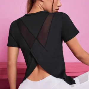 yoga kleding dames - zwarte top met ademende mesh voor optimale bewegingsvrijheid